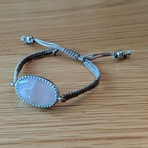 Tan cord adjustable bracelet with pink stone